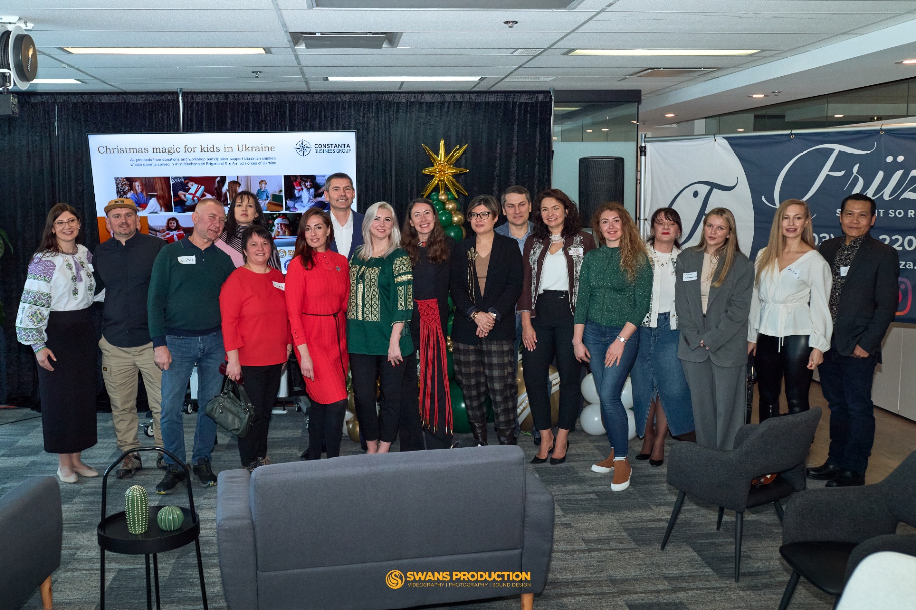 Organizers, volunteers, and supporters of Christmas Magic for Kids in Ukraine gathered at the Calgary charity event